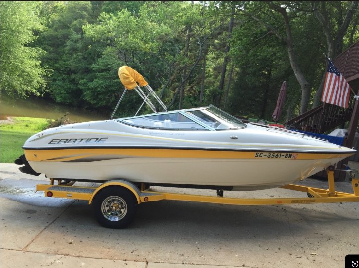 Yellow and white Ebbtide boat available as an optional rental