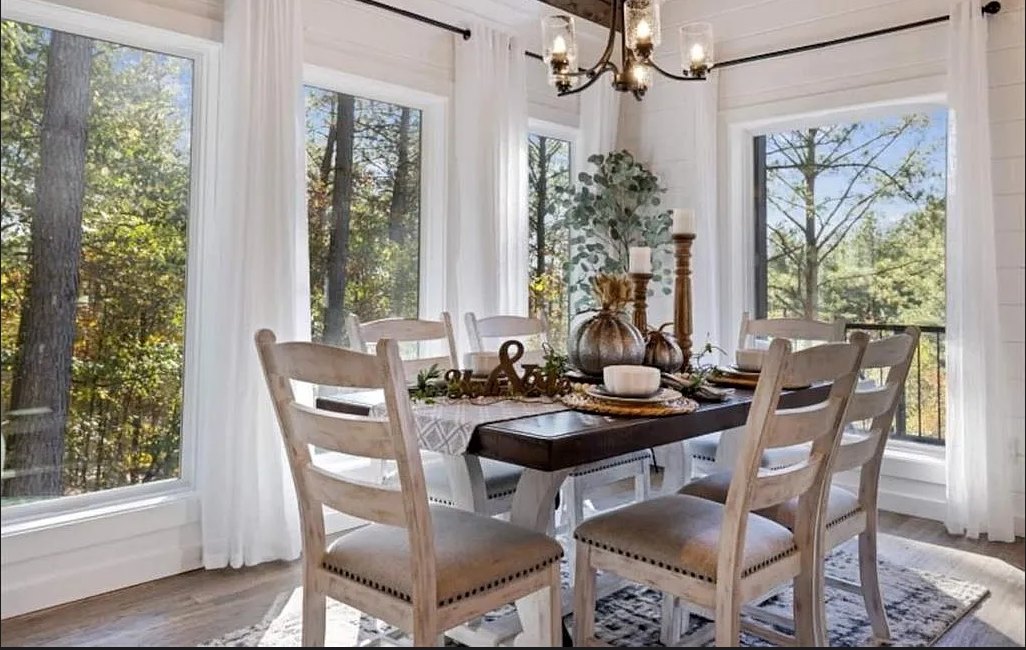 Dining room surrounded by windows